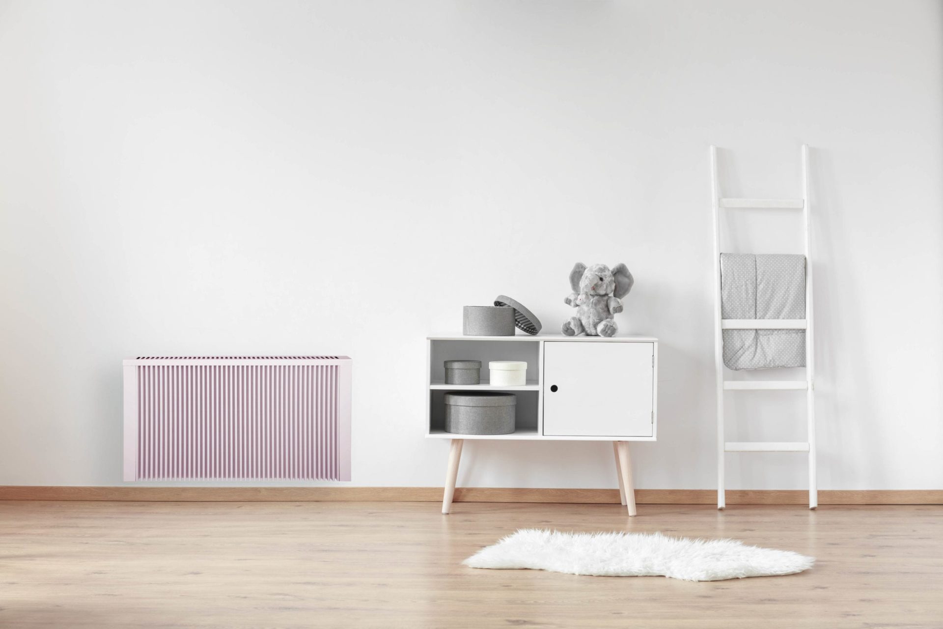 Cupboard with boxes and pink Sunflow radiator